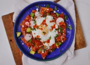 Made-at-home chilaquiles with tomato sauce