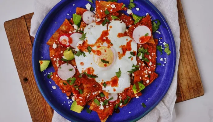 Made-at-home chilaquiles with tomato sauce